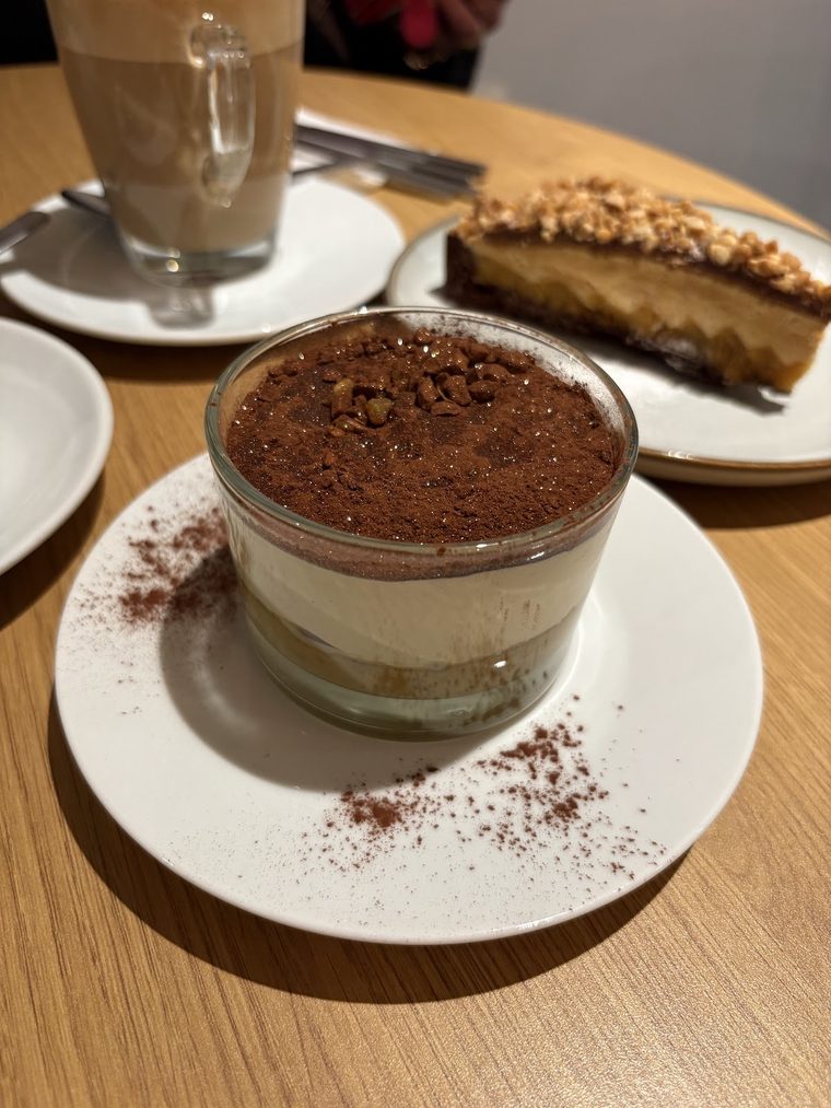 Tiramisu in a glass, dusted with cocoa